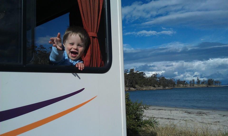 Happy Kid in a Motorhome